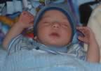 Sleeping with the blanket Grandma made me (21kb)