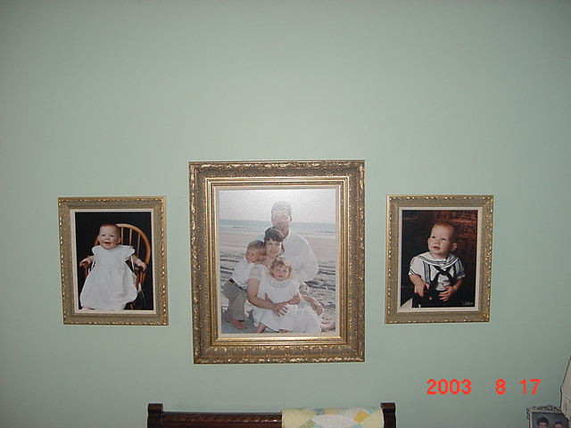 Family Portriat with gold frame, linean insert, and no glazing