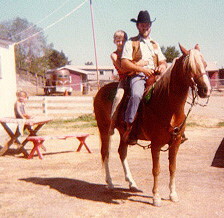Answer: Steven and Dad on horse, Mary on table