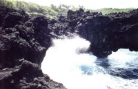 Waves Crashing Against The Lava Rocks