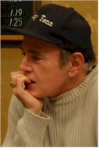 Director Walter Koeing evaluating his work at the Heartbreak Cafe bar.
