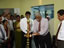 Lightening the oil lamy by Prof. VK Samaranayaka and Postmaster General in side