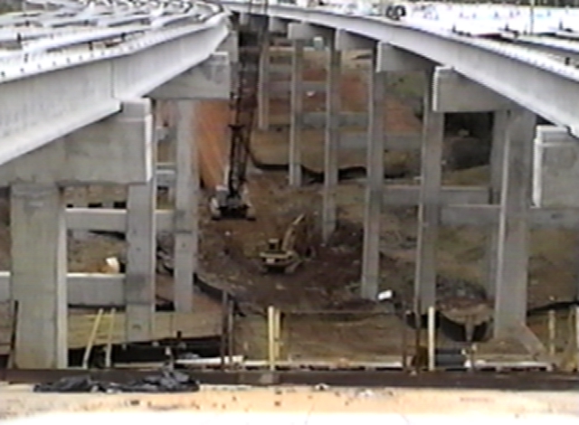 heavy equipment under the bridge