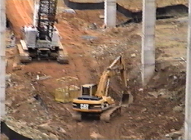 heavy equipment under the bridge