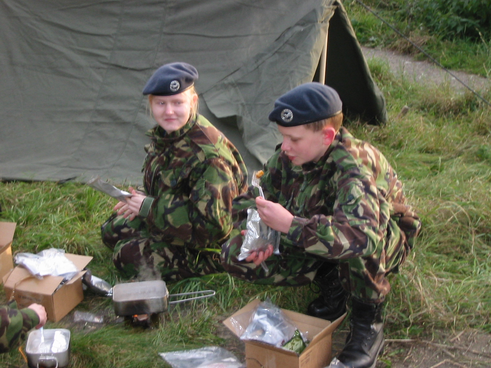 Cadets Rowe and Williams enjoying ration pack meals