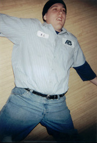 kc on the floor of a bowling alley