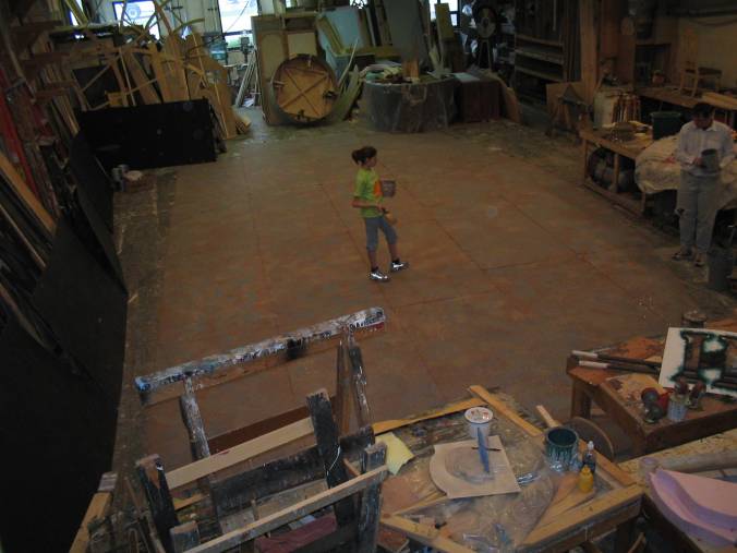 Allison painting Ida's floor