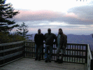 Chris Scott and Buck on a lookout deck.