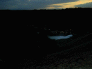 It's a little dark but this dam picture shows the dam outlet valve which allows the dammed lake to flow with regulated volume into the Gauley River