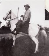 Jack riding his horse