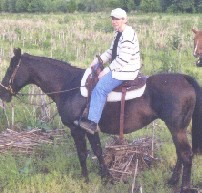Robin and Barbara on a trail ride
