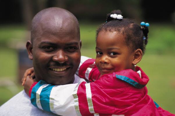 Dad Holding Toddler Daughter