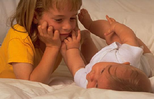 Big Sister Gazing at the Baby