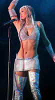 Coco Lee with arm raised