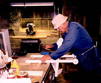 Elf hard at work - making sturdy doll buggys