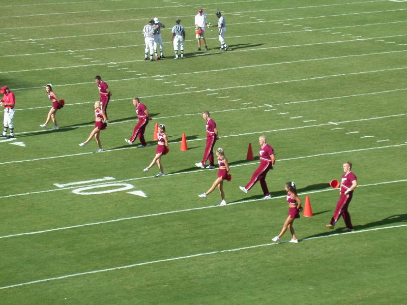 cheerleaders doing the hokie pokie