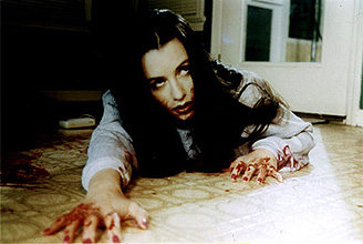 Debbie Rochon as Coach Riley