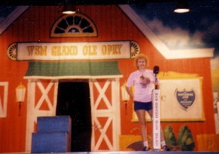 On the "Hallowed Stage" of The Grand Ole Opry.