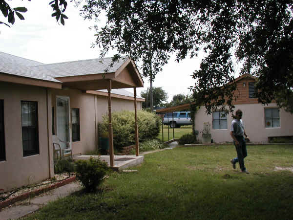 View of front yard and area between front of house and office building