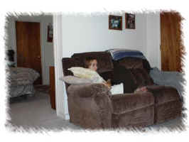 Living room and master bedroom through doorway