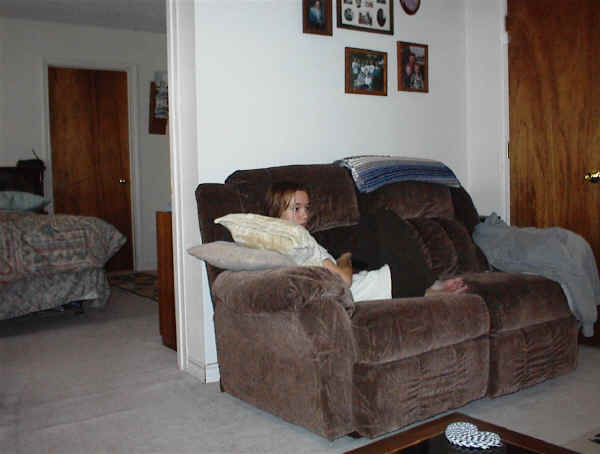 Living room and master bedroom through doorway