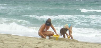 Julie and Violet in the sand.