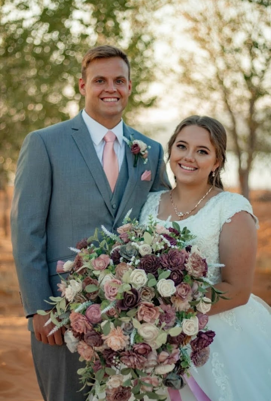 bride and groom with x-large bouquet