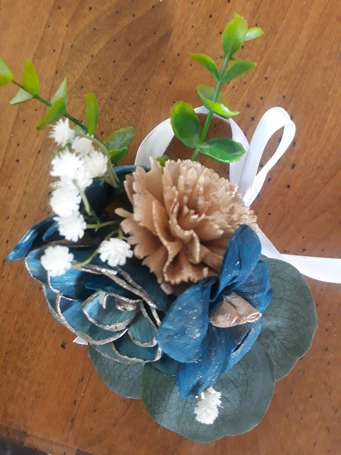 gold and navy corsage