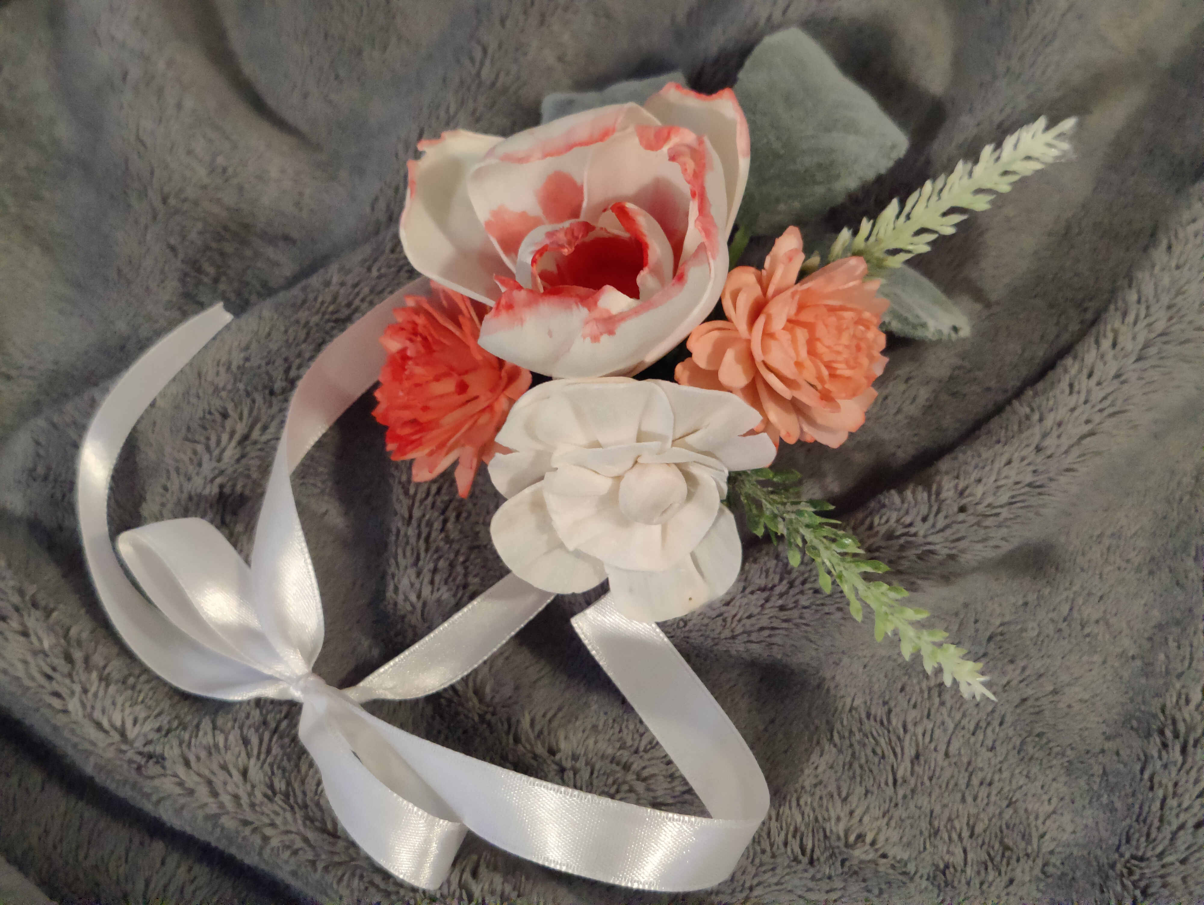 ruffled white and red peony corsage