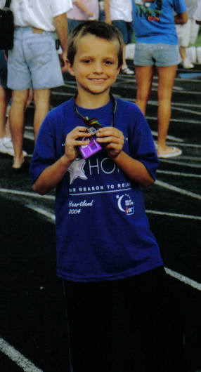 Brock with Survivor Medal