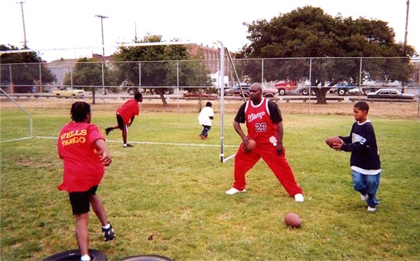 Day 2 of Camp - Coach Parker gets ready to throw that ball!