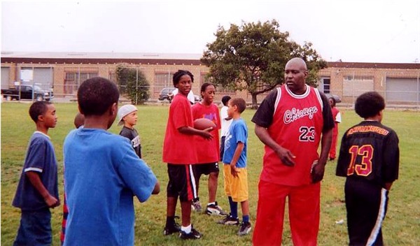 Coach Parker organizes the teams...