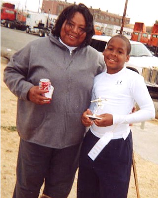 Mom wins TV (see photo below) & son wins Trophy!&nbsp; Day 3 of Camp - July 31st 2004.
