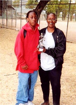 Son & Mom showing off the hard-earned Trophy!&nbsp; This activity brings families together.&nbsp; Day 3 of Camp, July 31st 2004