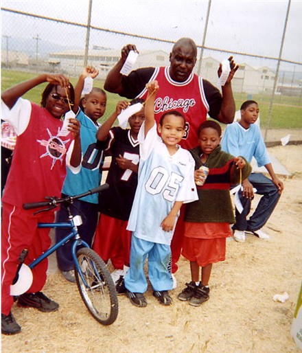 Coach Rodney Parker with some of his Show-Time Junior Show Stoppers, proudly displaying their participation ribbons!&nbsp; Day 3 of Camp - July 31st 2004