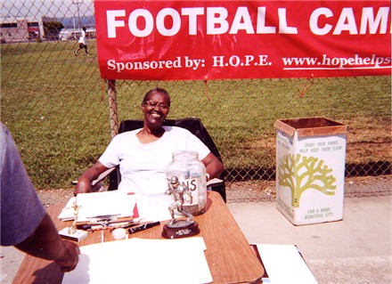 Betty Stevenson at our SIGN-UP table... Started out "relaxed" ended up "harrassed!!!!"&nbsp; Our 1st day of Camp, July 29th 2004