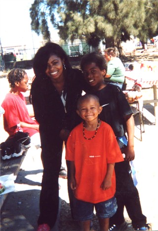 One of our beautiful mom's with her two sons...