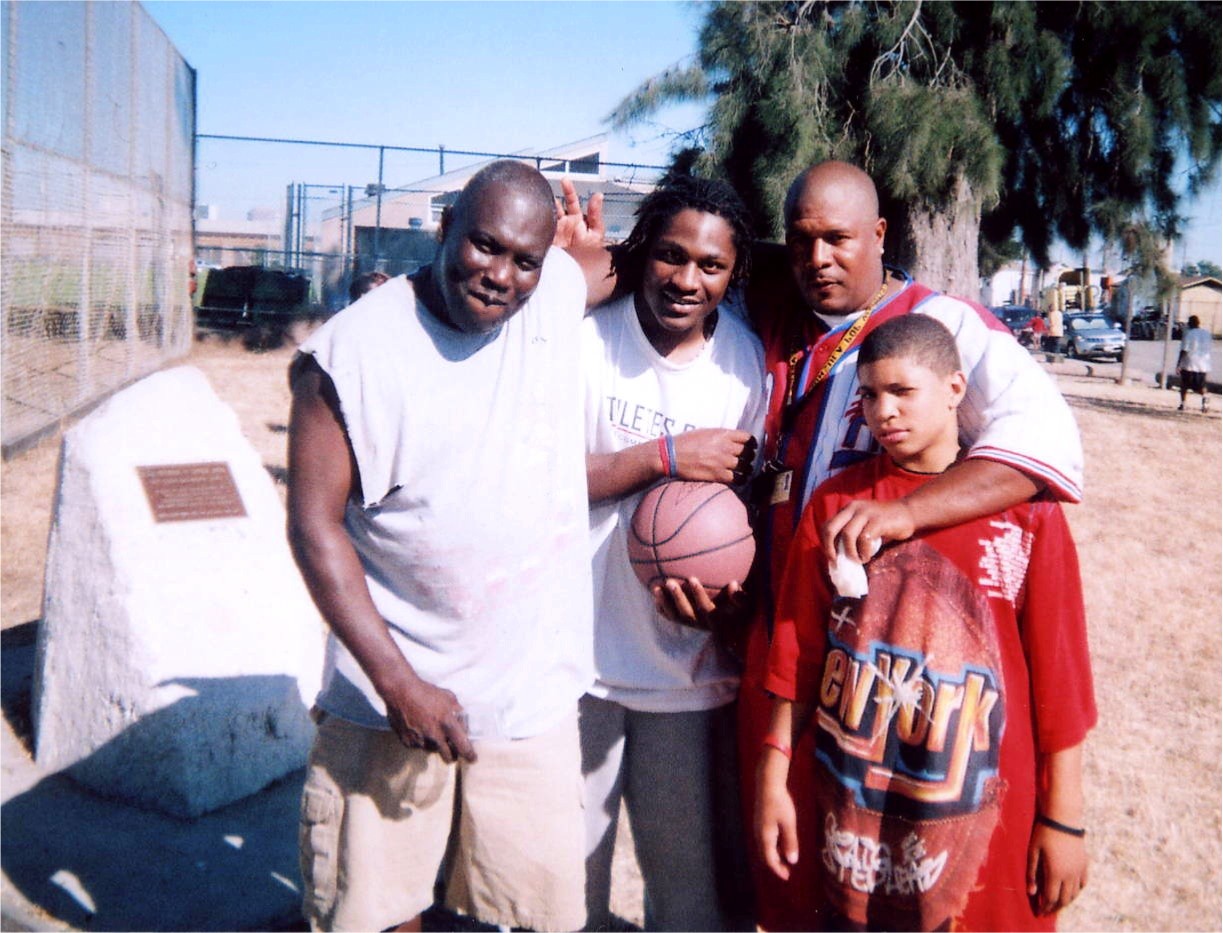 Coach Parker with two of his fellow Coaches & son