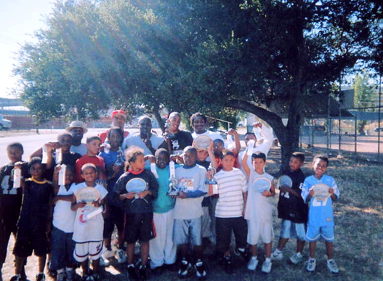 Some of our 2005 Camp attendees proudly displaying their ribbons and trophies.