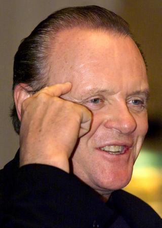 LOS ANGELES - Actor Sir Anthony Hopkins speaks at a reception honoring charity volunteerism in Los Angeles April 24. The event honored 15 volunteers of local charities, who received free laser eye surgeries from the Laser Eye Center in Los Angeles. Photo by Sam Mircovich (Reuters)