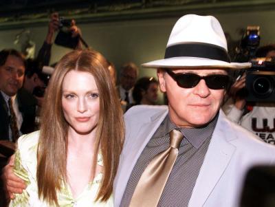 American actress Julianne Moore, left, and Anthony Hopkins arrive in Florence's historical Palazzo Vecchio prior to the start of the press conference announcing the start of the shooting of the movie 'Hannibal,' Thursday, May 4, 2000. A sequel to the Oscar-winner 'The Silence of the Lambs,' the movie will be directed by Ridley Scott, stars Hopkins Moore, and will be filmed for five weeks in Florence and its outskirts starting next Monday, May 8, 2000. Photo by Francesco Bellini (AP)