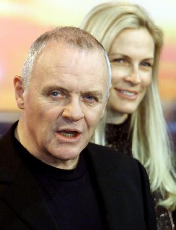 British actor Anthony Hopkins and Italian producer Martha De Laurentiis address a news conference to introduce the film 'Hannibal' screening at the 51st Berlin Film Festival February 11, 2001. Photo by Christian Charisius (Reuters)