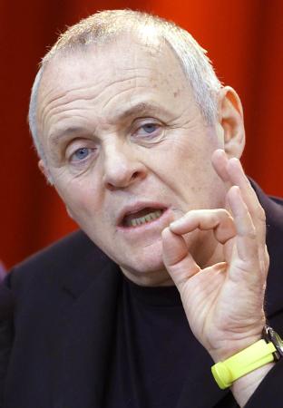 British actor Anthony Hopkins addresses a news conference to introduce the film 'Hannibal' screening at the 51st Berlin Film Festival February 11, 2001. 'Hannibal' opened at No.1 at the North American box office with record- breaking $58 million in ticket sales, according to studio estimates issued today./Christian Charisius (Reuters)