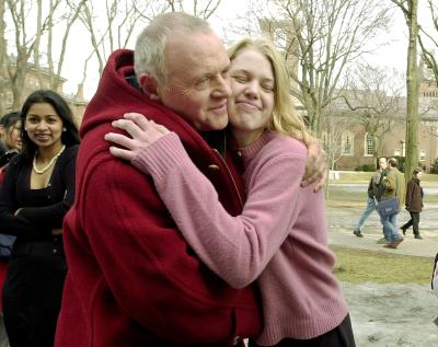Anthony Hopkins gets a hug from Harvard Radcliffe undergraduate student Anna Engstrom as Hopkins tours Harvard Yard in Cambridge, Massachusetts after arriving to be honored February 15, 2001 as the University's 'Hasty Pudding 2001 Man of the Year.'  Handout/Harvard News Office/Justin Ide (Reuters)