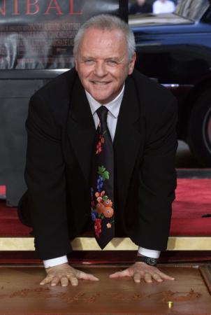 Actor Anthony Hopkins places his handprints in the forecourt of Mann's Chinese Theater Janaury 11, 2001 in Hollywood.  Photo by Fred Prouser (Reuters)