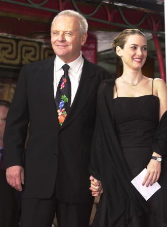 British actor Anthony Hopkins is joined by actress Winona Ryder before he got his hands and feet in the cement at the Mann's Chinese Theater in the Hollywood section of Los Angeles, Thursday, Jan. 11, 2001. Hopkins and Ryder acted together in the 1992 film, 'Bram Stoker's Dracula.' Photo by Chris Pizzello (AP)