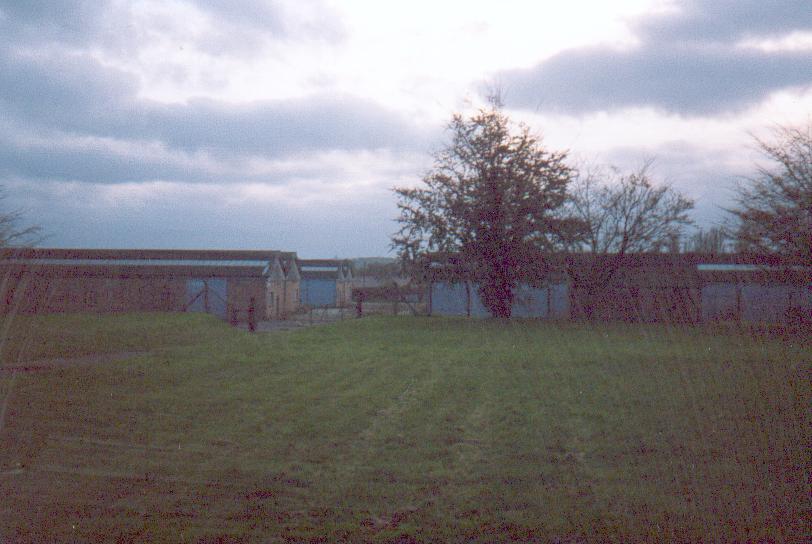 (c.1996) The road down to the engineering sheds from the main sites. the flat area of grass perhaps having been a small sports field