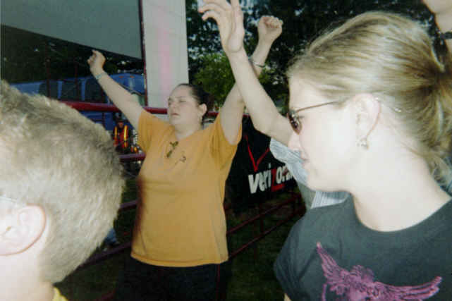 Shandi (orange) raising Holy Hands!