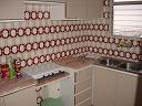our kitchen, complete with fridge, stove and sink