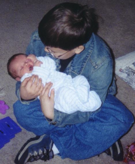 Lowell holding Aidyn.